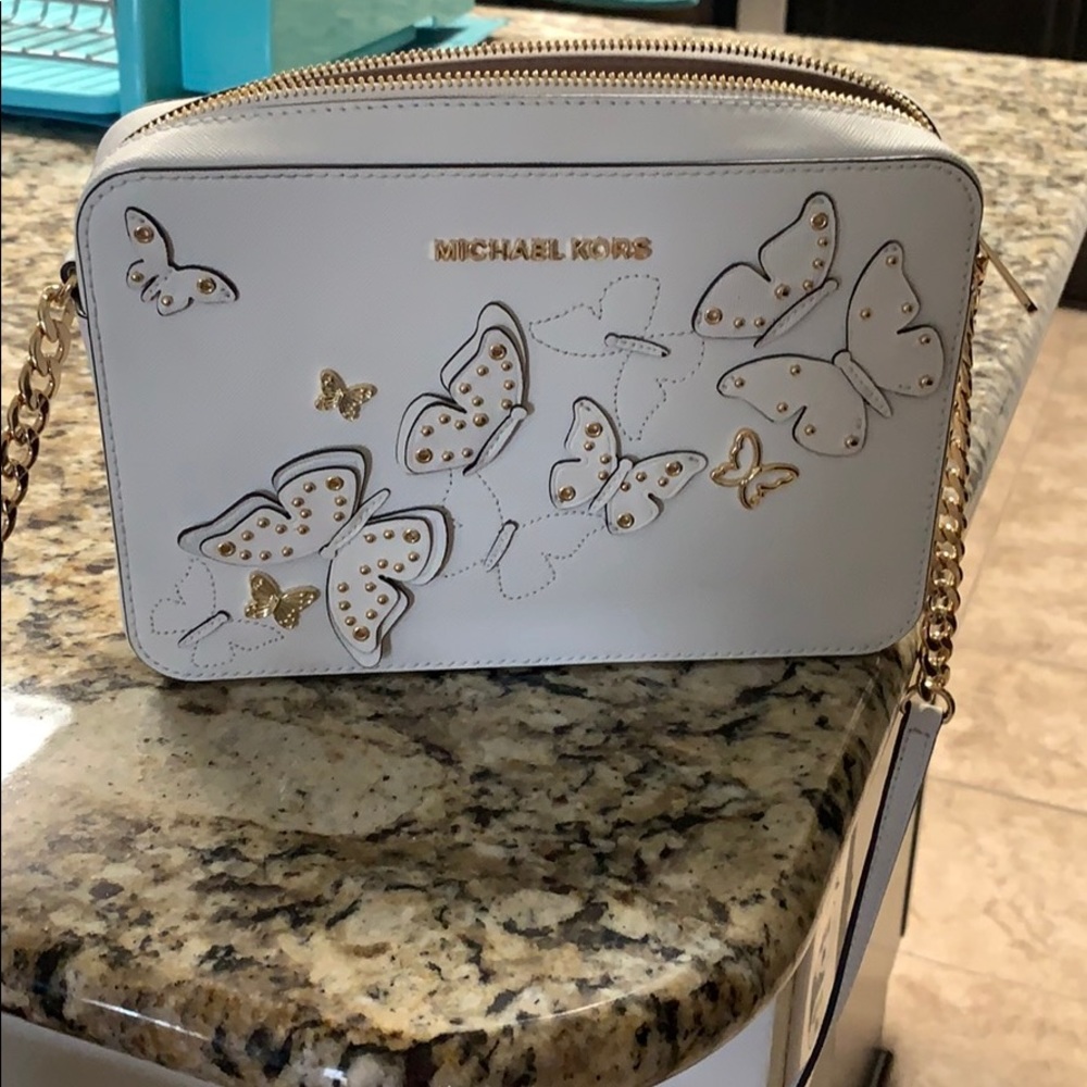 Michael kors butterfly crossbody.    Sold